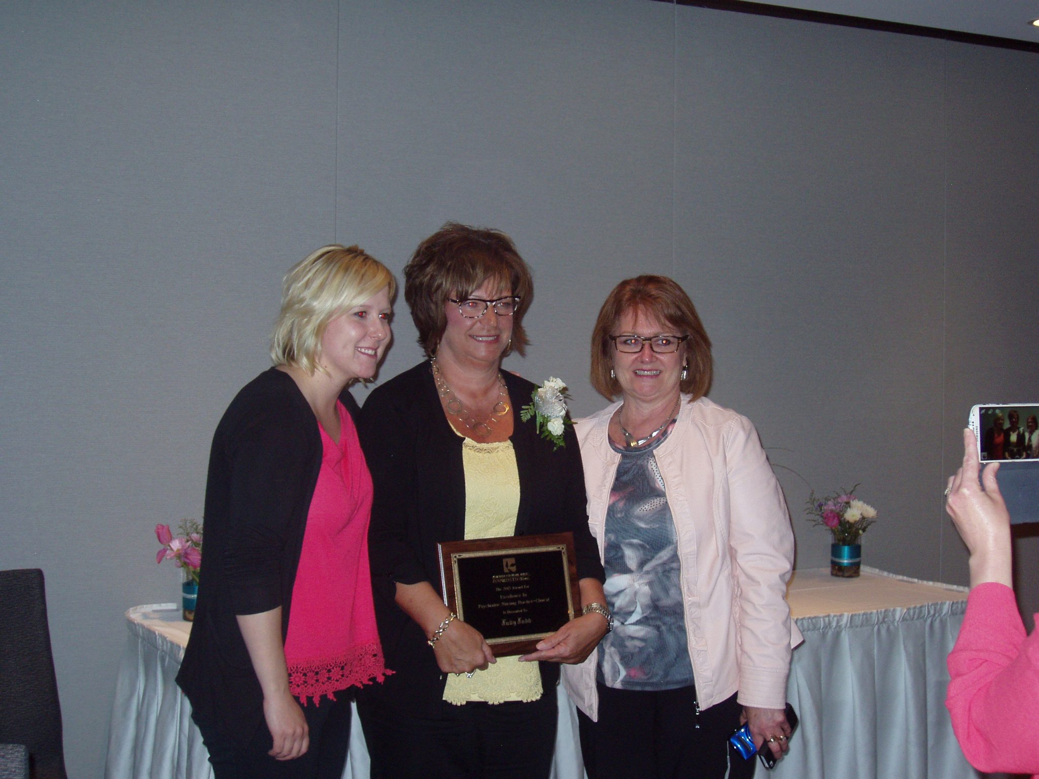 Judy Judd receiving the Award for Excellence in Psychiatric Nursing Practice--Clinical, with her two nominators, Kristine Lindsay (L) and Sharon Young (R). (Photo sent in by Marlene Fitzsimmons)